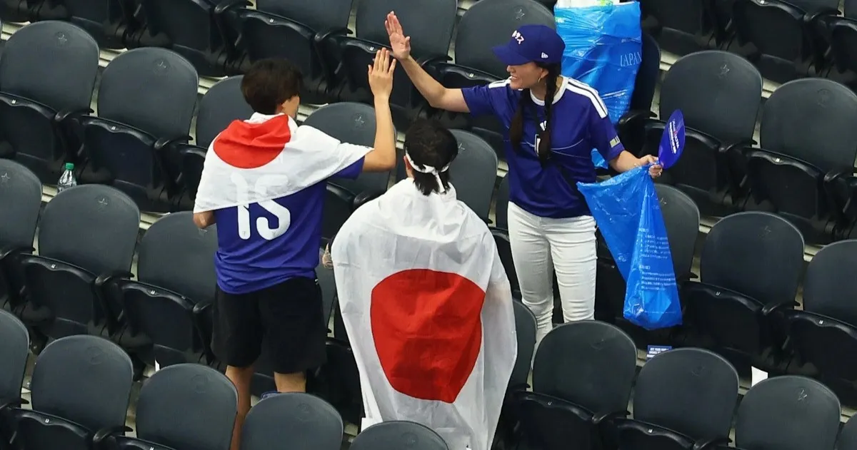 Japanese men clean stadiums and wives demand help