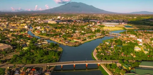 Marcos declares Naga a highly urbanized city and Robredo announces milestone